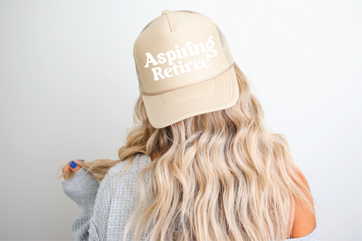 Aspiring Retiree DTF Printed Khaki Trucker Hat White writing
