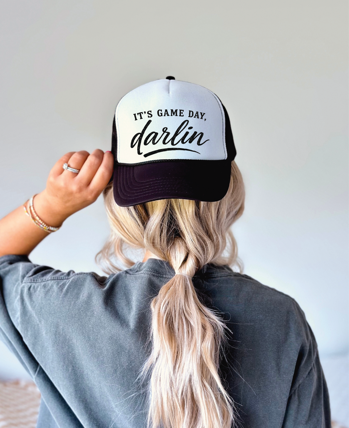 It's Game Day Darlin'- UNISEX BLACK AND WHITE Trucker Hat